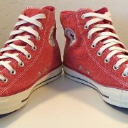 2017 Red Stonewashed High Top Chucks  Angled front view of 2017 red stonewashed canvas high tops.